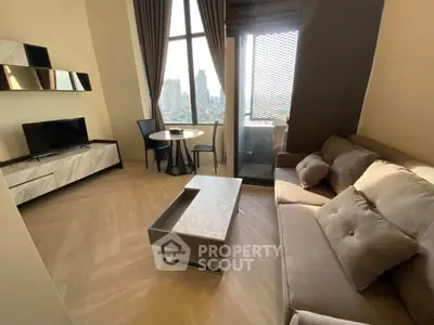 Modern living room with city view, stylish furniture, and natural light