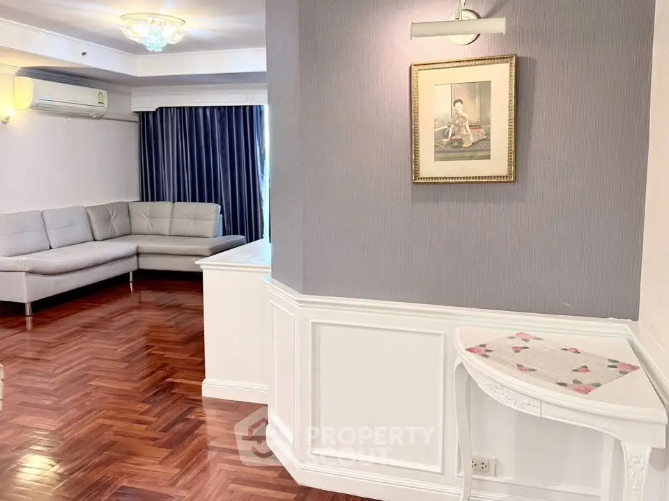 Elegant living room with parquet flooring and stylish decor