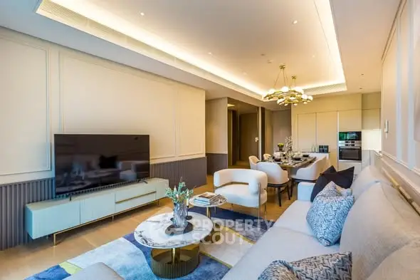 Luxurious modern living room with elegant decor and open kitchen layout, perfect for entertaining.