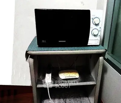 Modern kitchen with sleek appliances and contemporary design.