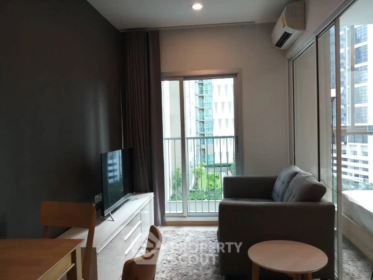 Modern living room with balcony view in urban apartment