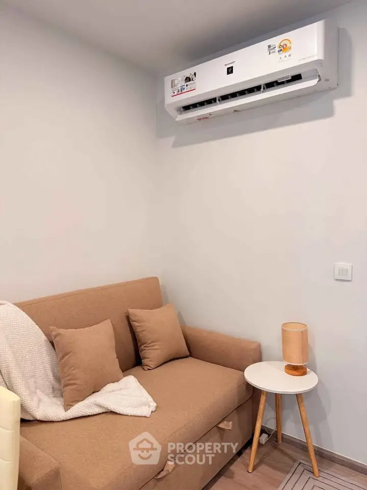 Cozy living room with modern air conditioning and stylish furniture