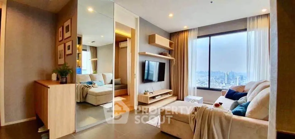 Modern living room with city view, cozy seating, and stylish decor.