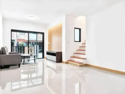 Spacious modern living room with sleek design and natural light