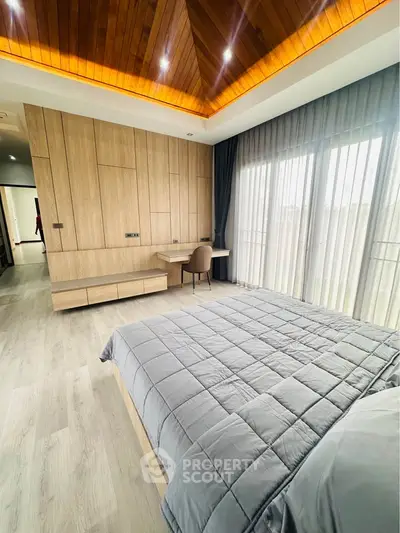 Luxurious bedroom with modern wood paneling and large windows