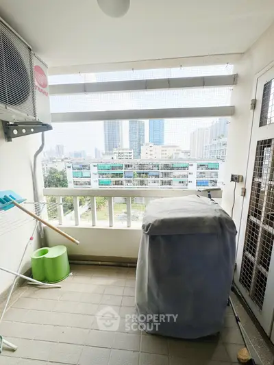 Charming balcony with city view, perfect for relaxation and fresh air.