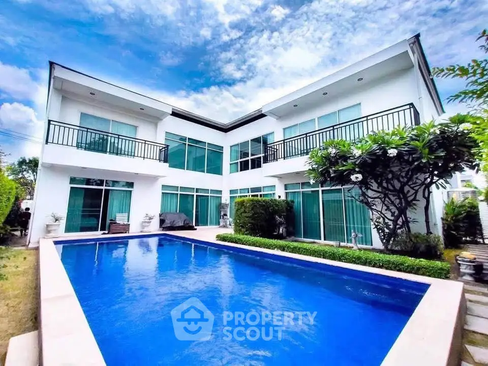 Stunning modern villa with private pool and lush garden, perfect for luxury living.