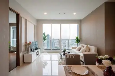 Spacious modern living room with panoramic city view and elegant decor