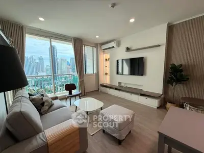 Modern living room with city view, stylish furniture, and large windows.