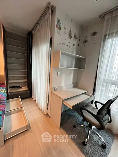 Modern study room with sleek desk, ergonomic chair, and stylish decor.