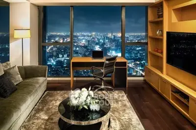 Luxurious living room with stunning city view, elegant furnishings, and modern decor.