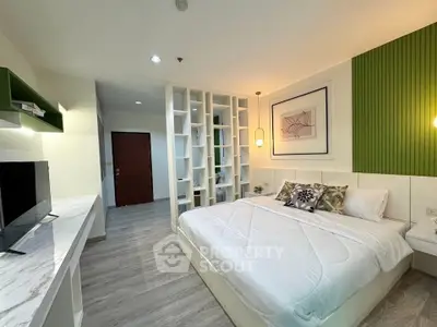 Modern bedroom with stylish decor and spacious layout