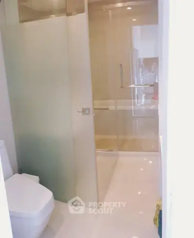 Modern bathroom with glass shower and sleek design