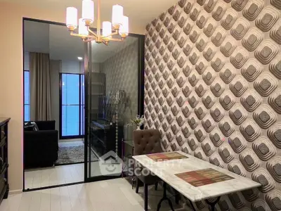 Stylish modern living room with unique wallpaper and elegant lighting