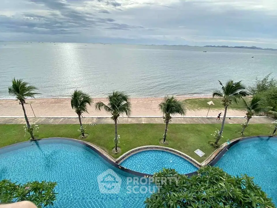 Stunning beachfront property with infinity pool and ocean view, perfect for luxury living.