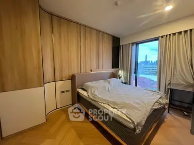 Modern bedroom with city view, featuring sleek wooden paneling and large windows for natural light.