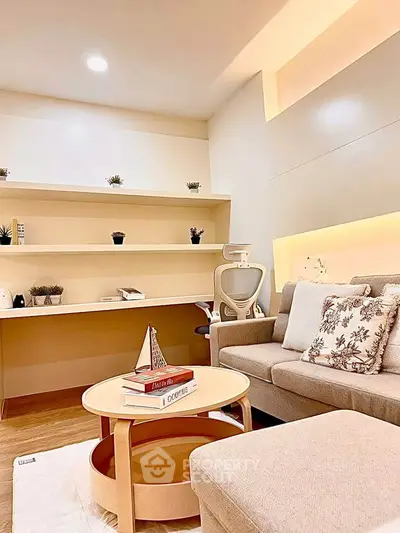 Modern living room with stylish furniture and cozy lighting, perfect for relaxation and entertaining guests.