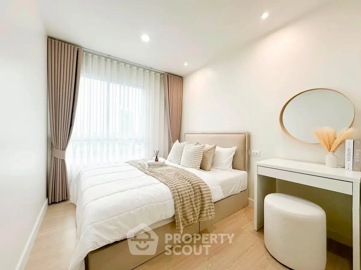 Cozy and elegant bedroom with natural light and modern decor