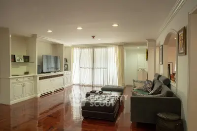 Spacious living room with elegant decor and natural light