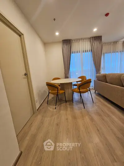 Modern living room with cozy seating and elegant decor