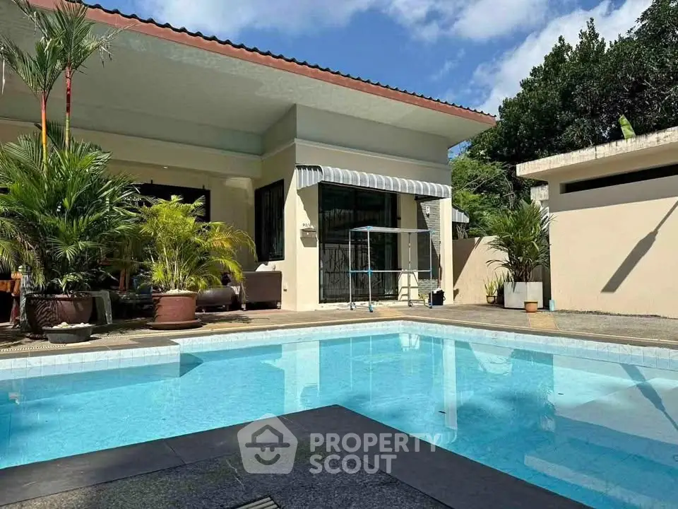 Luxurious villa with private pool and lush garden, perfect for relaxation and entertainment.