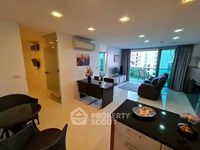 Spacious modern living room with open layout and city view, featuring elegant furniture and bright lighting.