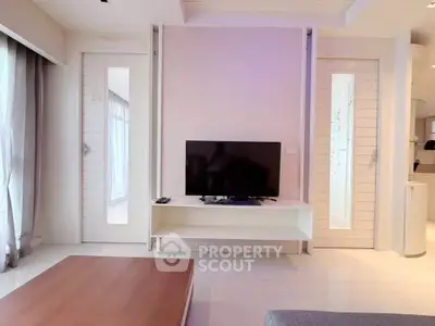Modern living room with sleek TV setup and stylish decor