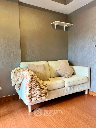 Cozy living room with stylish sofa and elegant decor