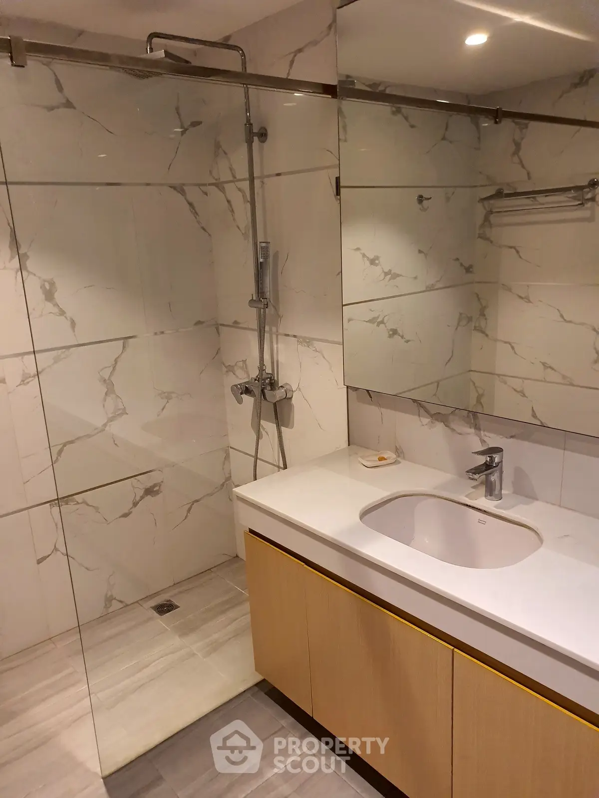 Modern bathroom with sleek marble tiles and elegant fixtures