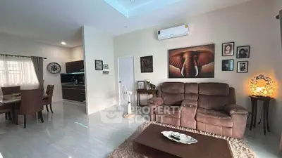 Spacious living room with cozy seating and elegant decor in modern home.