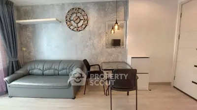 Modern living room with stylish decor and comfortable seating in a contemporary apartment.