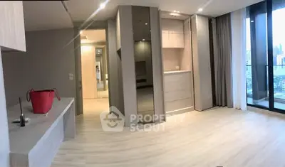 Spacious modern living room with large windows and city view balcony