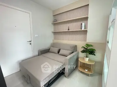 Modern compact living room with stylish sofa bed and elegant decor