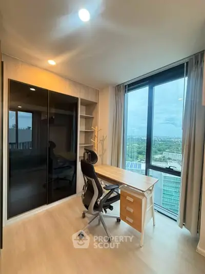 Modern study room with city view, featuring sleek desk and ergonomic chair, ideal for productivity.