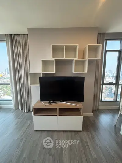 Modern living room with stylish TV unit and panoramic city view