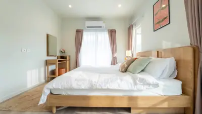 Bright and cozy bedroom with modern decor and natural light