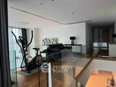 Luxurious modern living space with exercise bike and elegant decor