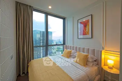 Luxurious bedroom with stunning city view and modern decor