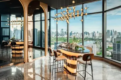 Luxurious high-rise apartment with stunning city skyline view and modern interior design.