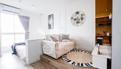 Modern studio apartment with stylish decor and cozy living area.