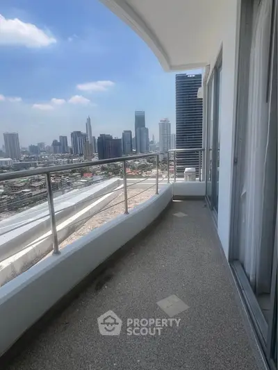Stunning high-rise balcony with panoramic city views, perfect for urban living enthusiasts.