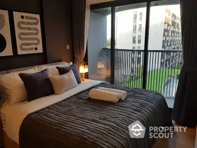 Modern bedroom with balcony view in luxury apartment