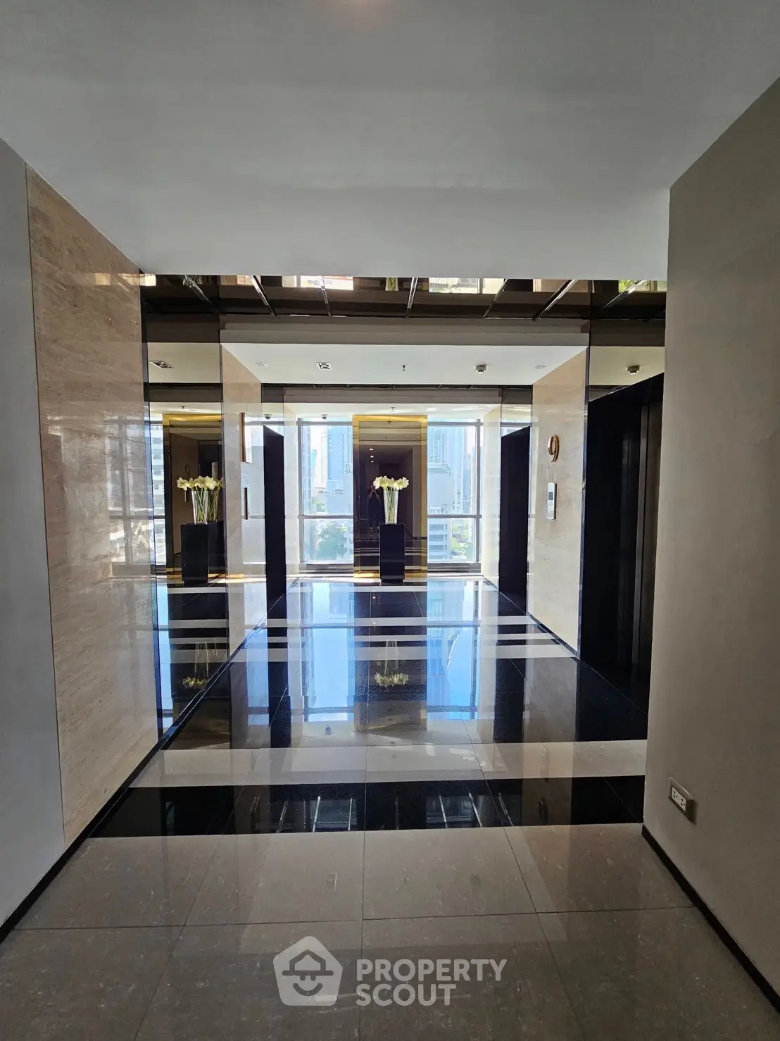 Luxurious modern elevator lobby with sleek design and polished floors