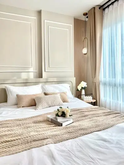 Luxurious bedroom with elegant decor and natural light