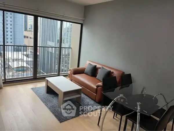 Modern living room with city view, stylish furniture, and large windows.