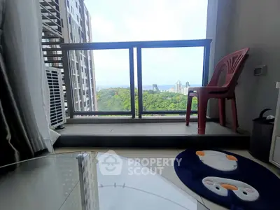 Spacious balcony with stunning city view, perfect for relaxation and enjoying the skyline.