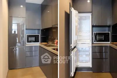 Modern kitchen with sleek cabinetry and built-in appliances, showcasing a stylish and functional design.