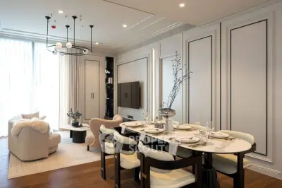 Luxurious modern living room with elegant dining area and stylish decor.