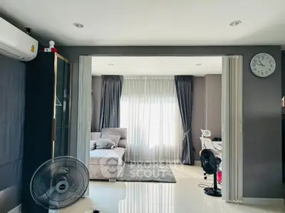 Spacious modern living room with elegant decor and natural light