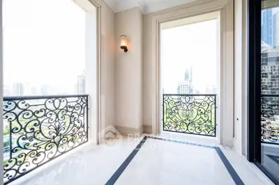Luxurious balcony with ornate railings and stunning city view